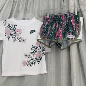 Nike White Tee with Pink Floral Accents & Multicolor Athletic Shorts